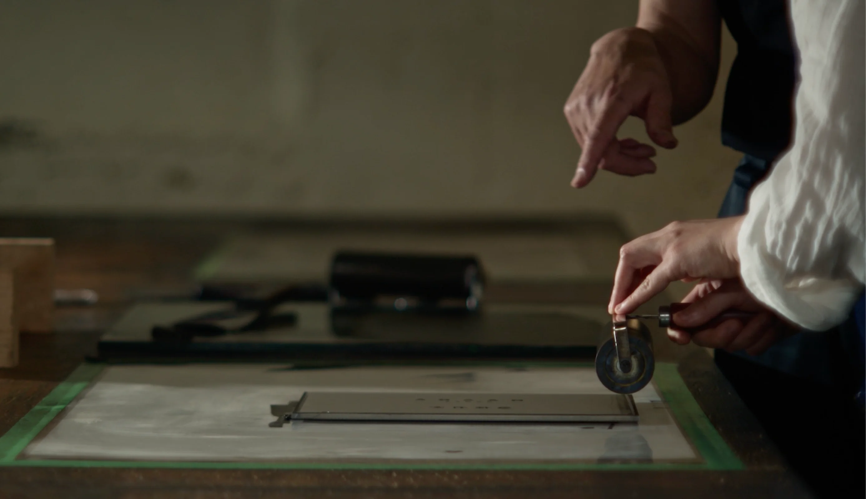 Preparing to apply ink to a woodblock print